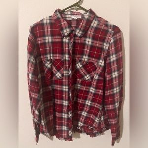 Plaid button down shirt.